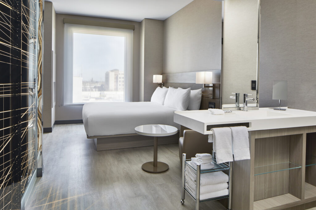 A view of the AC Sacramento Hotel guestroom, designed by AXIS Architecture + Design