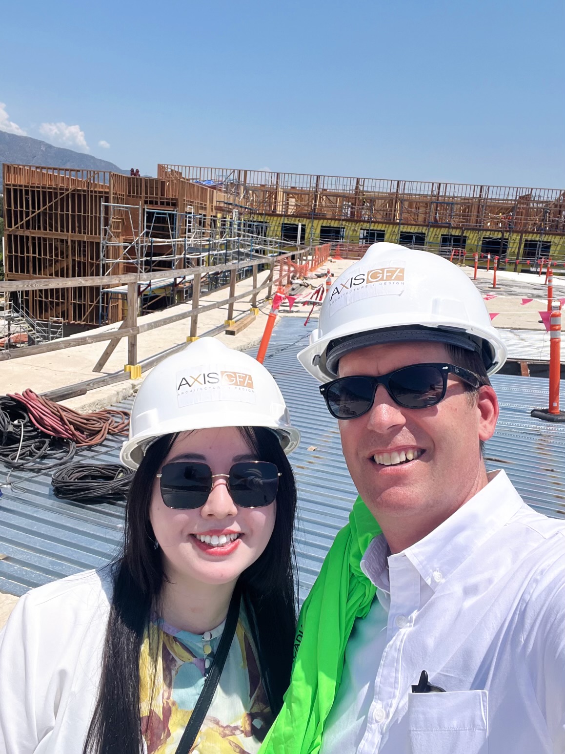 Los Angeles hotel architects Kevin Sund and Chunxiao Wang at the topping-out ceremony of the Hilton Arcadia adaptive reuse hotel project